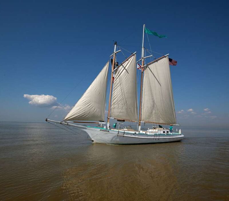 Sail boat sailing through water
